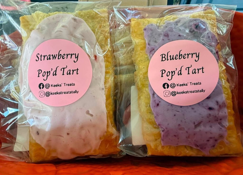 Strawberry and blueberry Pop’d Tarts wrapped and labelled with Keeks’ Treats stickers